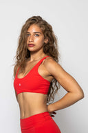 motion sports bra in coral